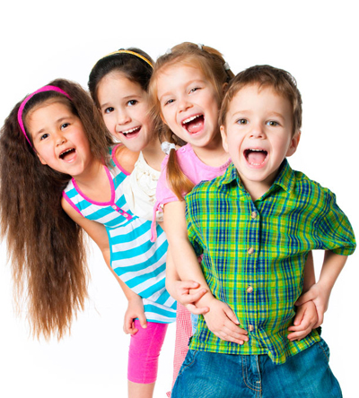 Young boy with three girls standing behind him - for information on pediatric dentistry in West Seneca